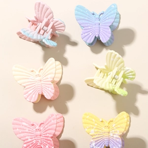 Lot de pinces à cheveux papillon à texture mate et design tacheté de blanc, couleurs variées