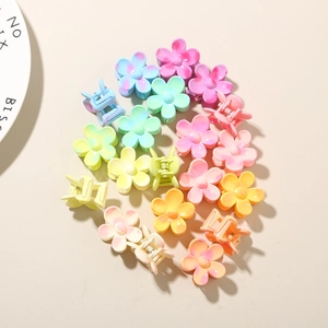 Set of colorful matte petal hair claw clips in macaron colors for elegant ponytails