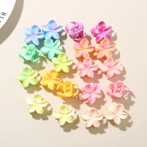 Mini pinces à cheveux fleurs de frangipanier mates aux nuances pastel dégradées
