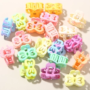 Mini plastic hair claw clips set with bow and flower designs in macaron gradient colors