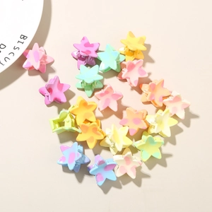 Colorful star hair clips in macaron shades with polka dot patterns for women