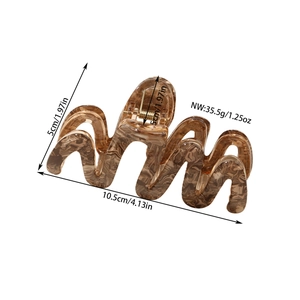 Detailed size view of a large amber acetate hair claw clip with 10.5cm measurements
