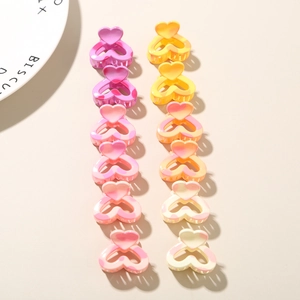 Set of colorful marble pattern heart-shaped mini hair claws for styling side bangs