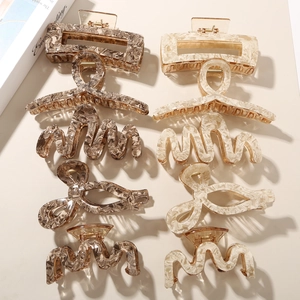 Set of 10 marble acetate hair claws in brown and beige with various elegant shapes