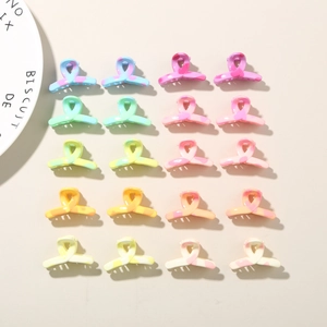 Set of 20 mini candy colored marble hair clips in neat grid layout for daily hairstyling