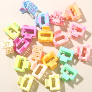 Set of mini square matte hair claws in vibrant macaron colors with cow pattern texture