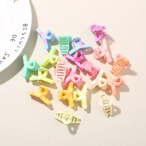 Detailed macro view of macaron colored marble textured hair claw clips set