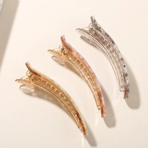 Trois pinces à cheveux élégantes en acétate, motifs ambre, rose et marbre gris