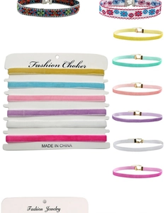 Close-up of colorful velvet choker necklaces set with lobster clasp and display cards