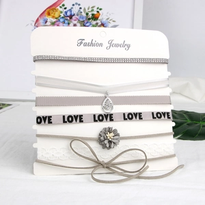 6-piece set of elegant grey and white velvet chokers with lace and rhinestone details