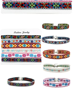 Detailed view of bohemian embroidered chokers with floral patterns and lobster clasps