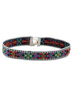 Detailed macro view of bohemian colorful embroidered choker with adjustable silver clasp
