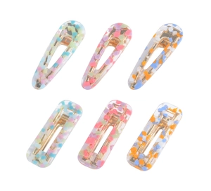 Détail du lot de 6 barrettes en acétate avec motifs marbrés en forme de goutte et rectangle