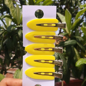 5-piece set of bright yellow leaf-shaped hair clips for makeup and fringe styling