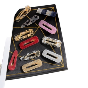 Assorted amber acetate hair clips in marble and glitter styles for women's fashion