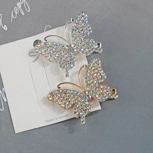 Sparkling butterfly hair clips with crystals and rhinestones in gold and silver finish