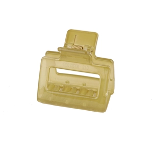Close-up of translucent rectangular acrylic hair claw clip with golden metal spring
