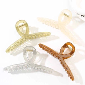 Detailed set of four 13cm large hair claw clips in amber brown, grey, cream and olive green