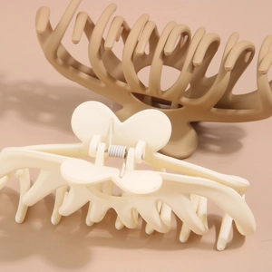 Large matte butterfly hair claw clips in beige and light coffee colors for women