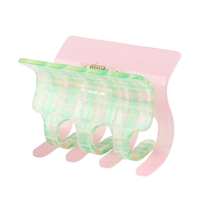 Pink and green checkered acetate square hair claw clip with glossy finish and metal spring