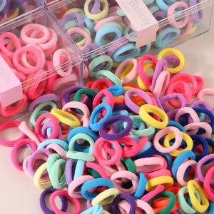 Set of 80 colorful high-elasticity 2.5cm hair ties for kids in a transparent box