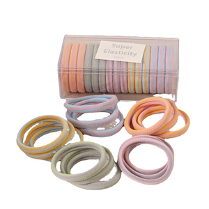 15-piece set of colorful high elasticity hair ties in a clear storage box
