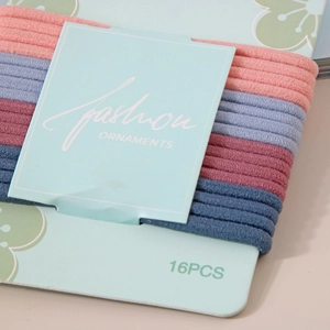 Close-up of 16-piece high elasticity ribbed hair ties on display card in four elegant colors