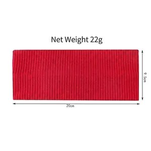Red knitted elastic headband with dimensions 20cm by 9.5cm in ribbed texture