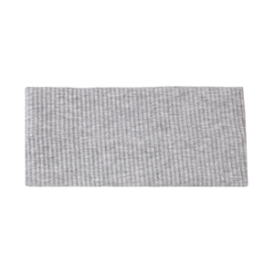 Close-up of grey knitted ribbed headband showing detailed elastic fabric texture