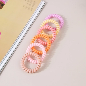 Set of 6 colorful spiral telephone wire hair ties in vibrant macaron pastel shades