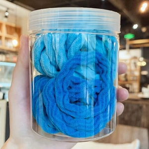 Blue gradient seamless hair ties set in clear storage jar with elastic thread design