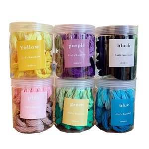 Rainbow gradient spiral hair ties set in clear jars for seamless high elasticity hold