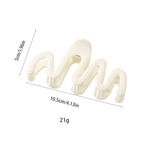 Detailed size chart of cream wavy hair claw clip showing 10.5cm length and resin material