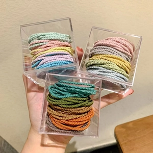 Colorful high elasticity braided hair ties set in a transparent acrylic display box