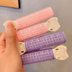 Quattro clip volumizzanti rosa e viola per radici dei capelli con piccoli ganci interni