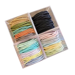 High elasticity colorful hair ties set in clear boxes with woven texture design