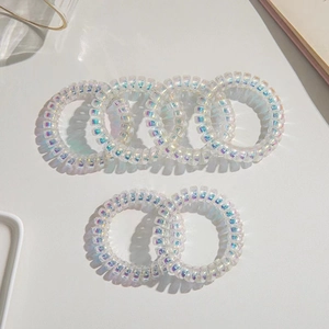 Lot de six élastiques spirales translucides à reflets irisés avec finition laser