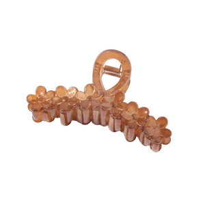 Detail of amber large floral hair claw clip with six flowers and metal spring