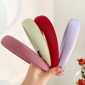 Handmade padded satin headbands in green pink red and purple with high top design