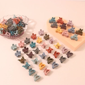 Mini floral and butterfly hair claw clips set in pastel macaron colors for women