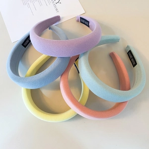 Five-piece candy-colored padded sponge headbands with satin-like twill fabric texture