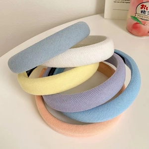 Five-piece set of colorful knitted padded headbands with soft sponge padding for women