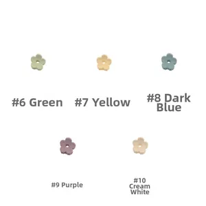 Matte flower hair clips set in green, yellow, blue, purple, and cream colors
