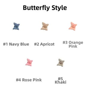 Detailed set of matte butterfly hair clips in five colors like navy and apricot