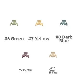 Detailed grid view of wave-shaped matte hair claws in green, yellow, blue, purple, and cream
