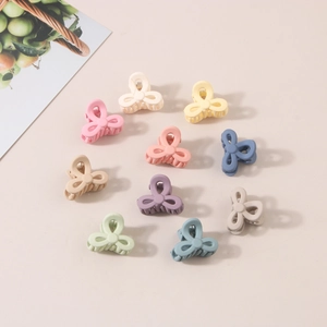 Set of ten colorful matte flower hair clips for women in morandi tones with a small size