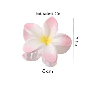 Pince à cheveux fleur de frangipanier avec dégradé rose et blanc pour chignons