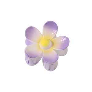 Vue détaillée d'une grande pince à cheveux frangipanier avec dégradé violet et jaune