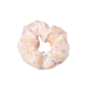 Chouchou géant minimaliste avec pois oranges et violets sur tissu beige clair soyeux