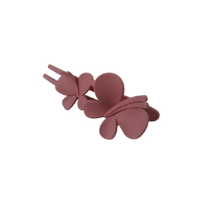 Close-up of dusty pink butterfly hair claw clip with matte finish and dual wings